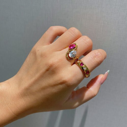 woman wearing pink heart zircon gold ring waterproof everyday jewelry