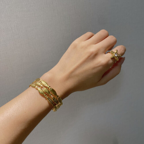 Marina gold fish bangle bracelet in 18K gold plated stainless steel