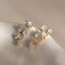 Gold zircon drop earrings with cascading cubic zirconia stones in 18K gold plated stainless steel