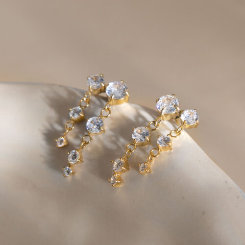 Gold zircon drop earrings with cascading cubic zirconia stones in 18K gold plated stainless steel