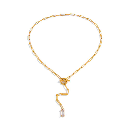 Real Me gold toggle necklace in 18K gold plated stainless steel with baguette zircon drop pendant