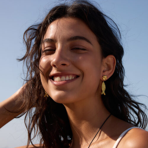 Gold fish drop earrings in 18K gold plated stainless steel with textured ocean-inspired design
