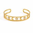 Luci gold moon and star bangle with sparkling zircon stars