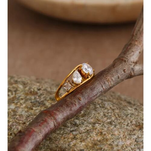 Aster gold three stone ring with sparkling CZ