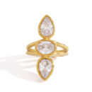 Adjustable 18K gold stainless steel ring with three clear pear and oval cubic zirconia stones