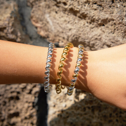 Swirl Cuff Bracelet in gold, silver, and two-tone stainless steel with sculptural curled metal links