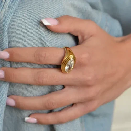 Ayla Ring – chunky gold East-West oval CZ signet ring with stepped bezel setting